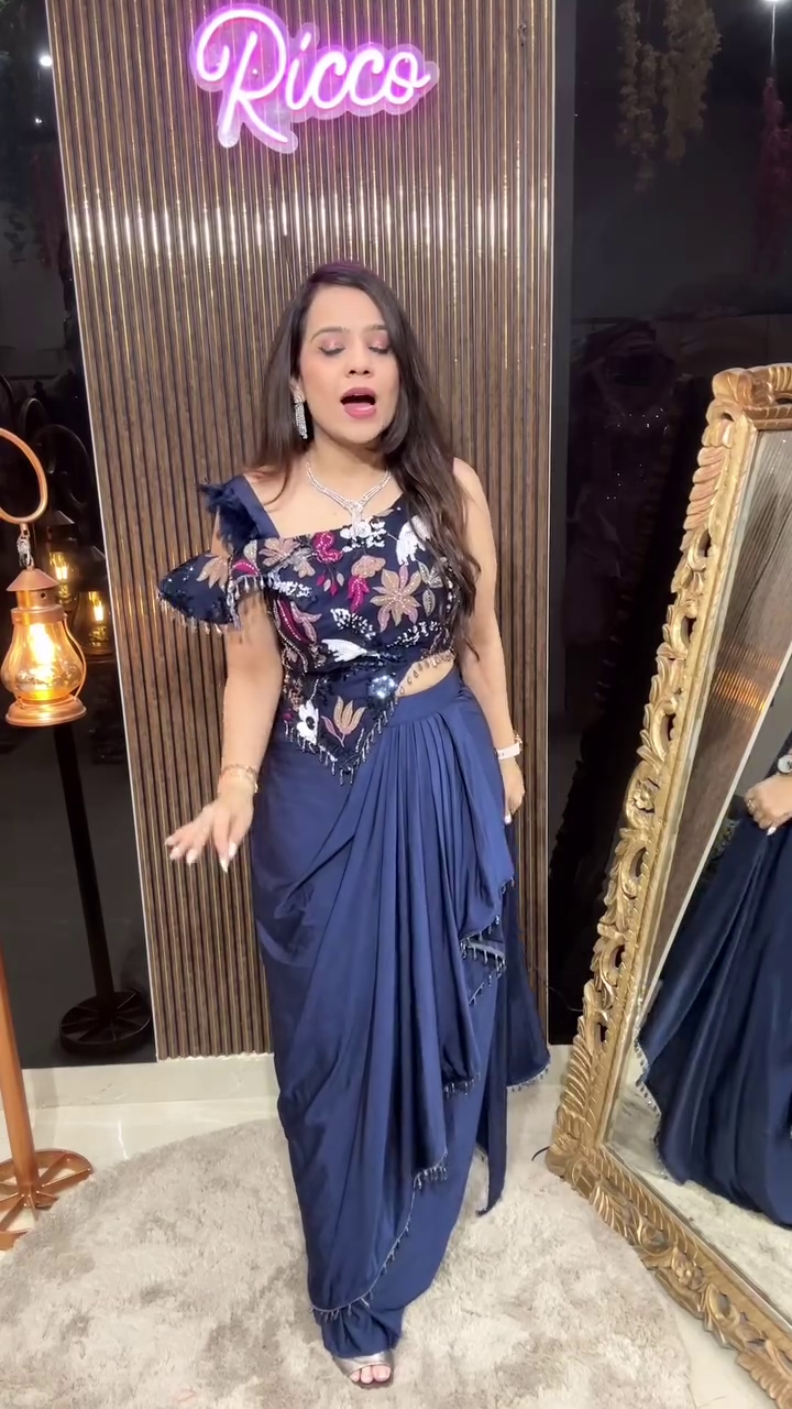 Embroidered Rust Orange Net Saree with Floral Blouse