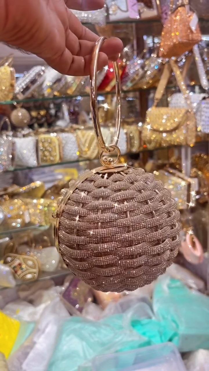 Round Beaded Crystal Clutch with Metal Ring Handle
