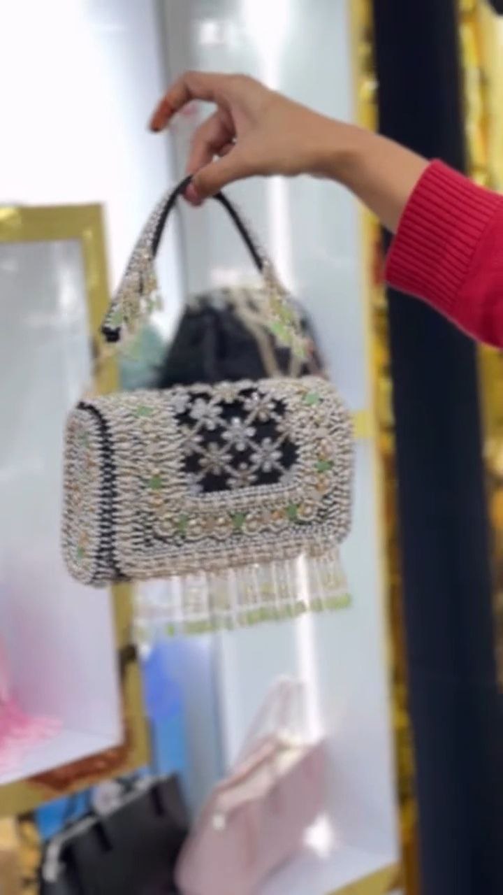 Pearl-Embellished Potli Handbag with Tassel Handle