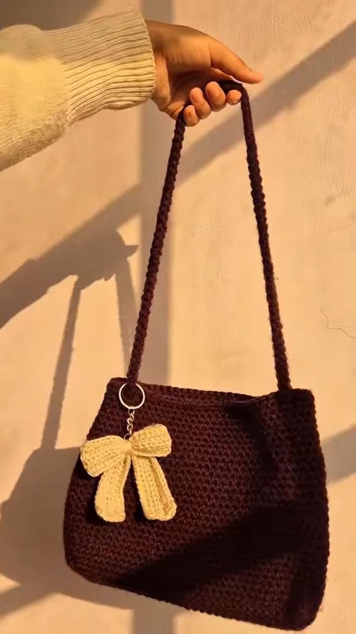 Handcrafted Crochet Shoulder Bag with Bow Charm - Image 2